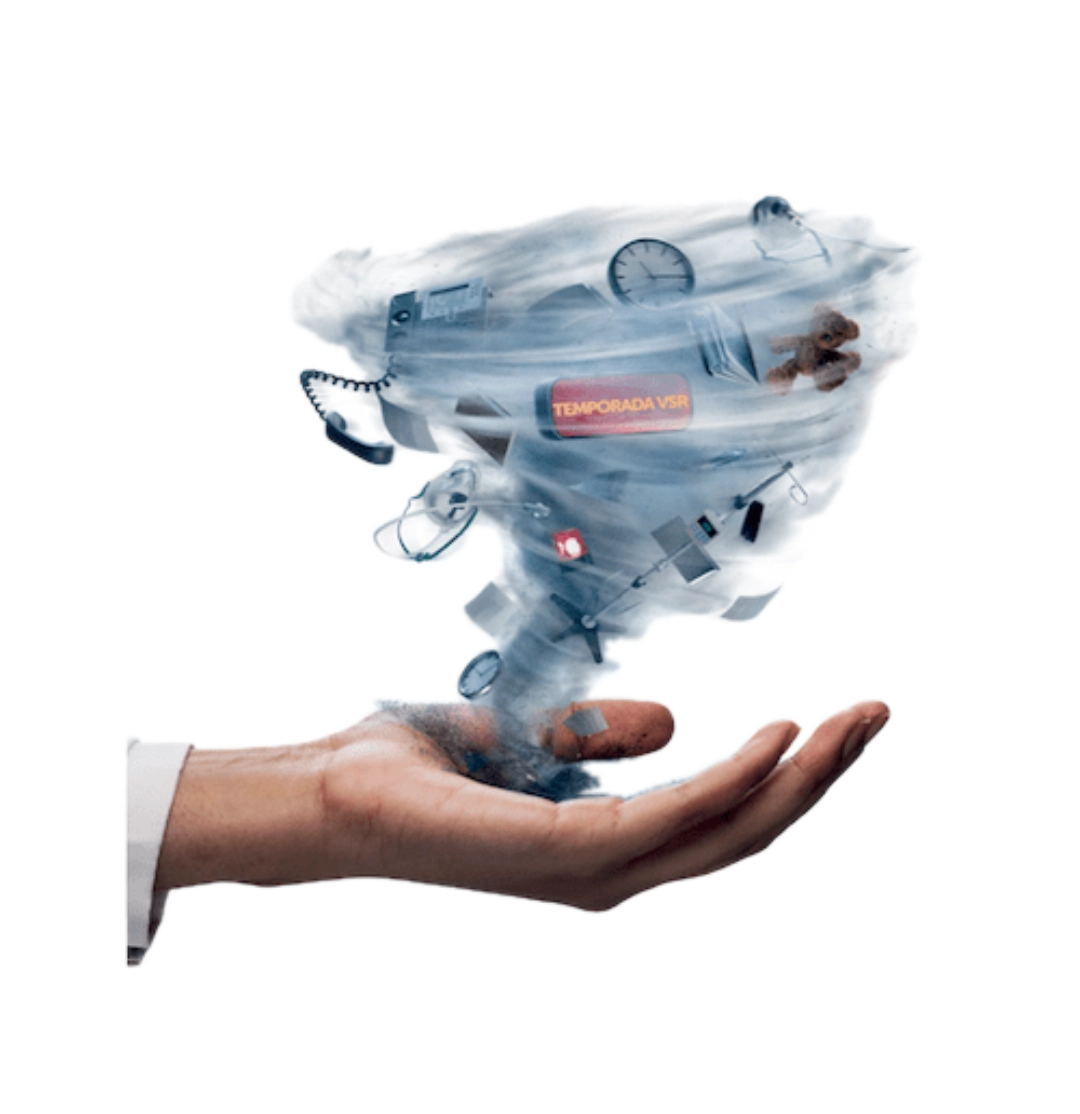 Una mano sostiene un tornado y lo controla